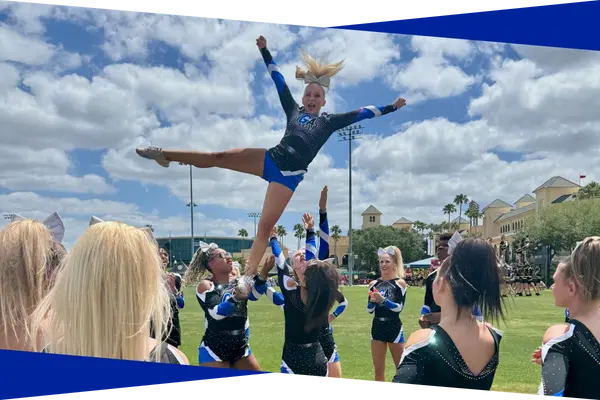 Genesis Athletix All Star cheer athlete held in a heel stretch stunt at a competition
